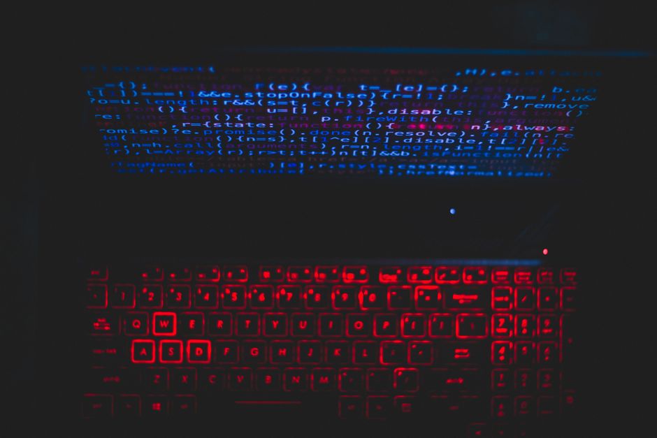 Abstract dark coding keyboard representing AI-generated code